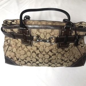 Great oversized Coach bag. hobo-ish. Loved and well used.